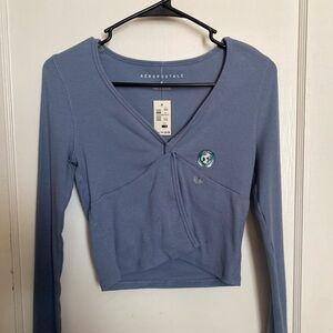 Hollister light blue, long sleeve twist flyaway tee, size small